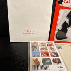 猫のミニアルバムと昔のカレンダー写真、マグネット、しおり？、謎の中国製ペーパーの画像