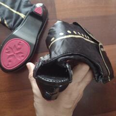 子供のコスチューム用のブーツの画像