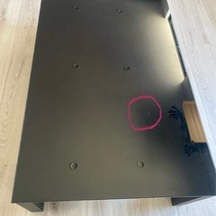 ニトリのガラスの黒ローテーブルの画像