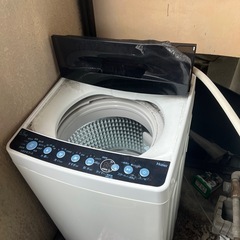 決まりました。　洗濯機　蓋が曲がってます