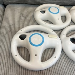 Nintendo wii マリオカート ハンドル コントローラー4つ の画像