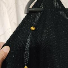肩開き春ニットの画像