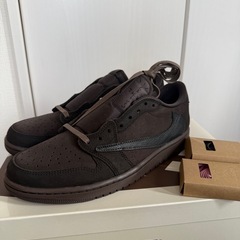Travis Scott × Nike Air Jordan 1...