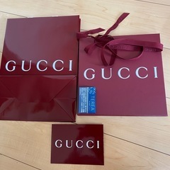 GUCCIの紙袋とリボンと封筒と空箱