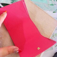 ピンク財布の画像