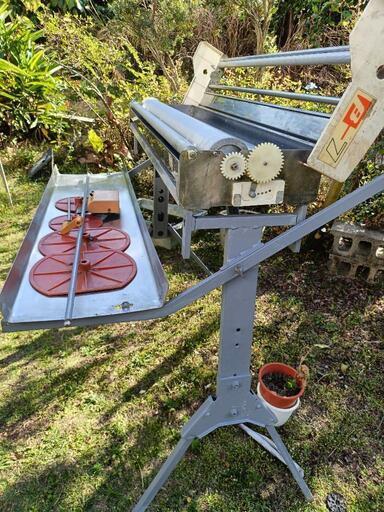 クロスのりつけ機