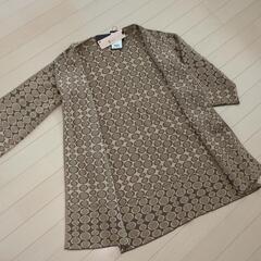 新品タグ付き B.yu コートの画像