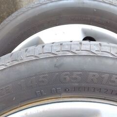 5000円から3900円に【三菱　アイ】純正ホイルキャップ付　中古　4本セット　ラジアルタイヤ　夏タイヤ　鉄の画像