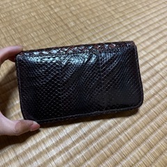 中古 ヘビ革財布の画像