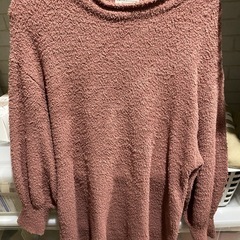 earth トップスの画像