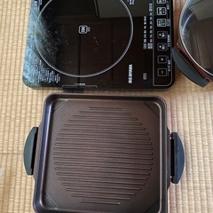 ＩＨクッキングヒーターとキッチン小物の画像