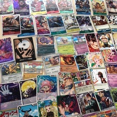ワンピースカードとポケモンカード、野球カードなどの画像