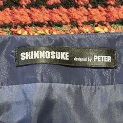 SHINNOSUKE PETER ネイビー ジャケットとスカートセットアップの画像