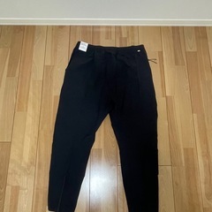 ナイキ メンズウープンコミュニターパンツの画像