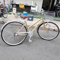 ゴールド・スポーツタイプ自転車の画像