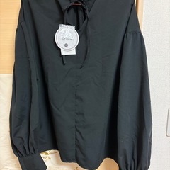 タグ付きシャツ　L size　の画像