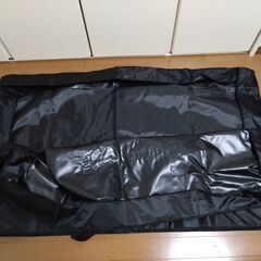 （商談中）輪行袋美品とチェーンカバー新品のセットです。の画像