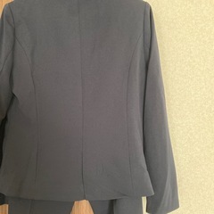 新品未使用 ノーカラー パンツスーツの画像