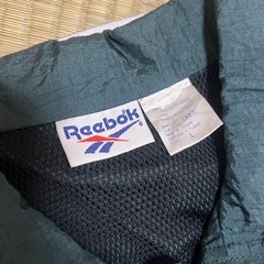 Reebok ナイロン ハーフジップの画像