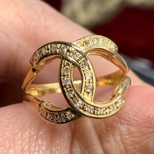 K18 ダイヤモンドリング　ココマーク　モチーフ　3.4g 0.12ct