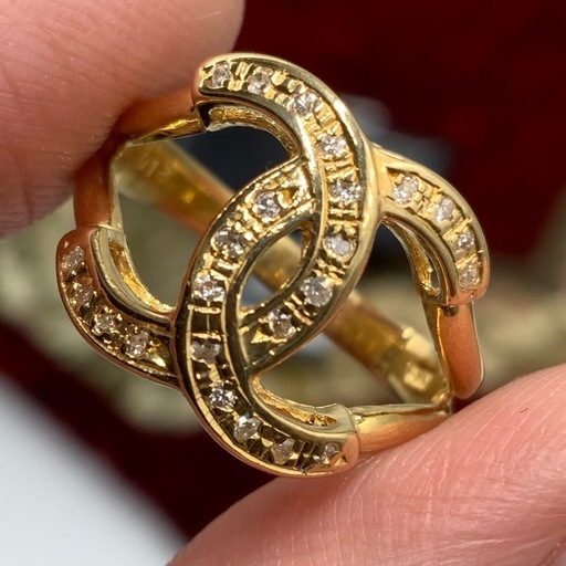 K18 ダイヤモンドリング　ココマーク　モチーフ　3.4g 0.12ct