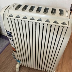 子供用すべり台 & デロンギヒーターの画像