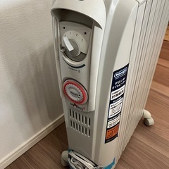 子供用すべり台 & デロンギヒーターの画像