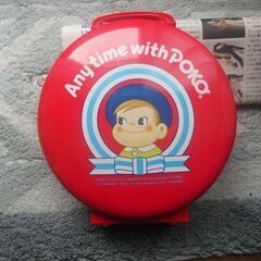 レトロなペコちゃん丸缶バックの画像