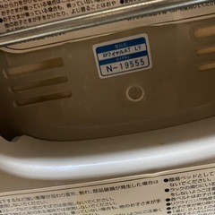 combi 電動ハイローチェア の画像