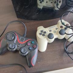 プレイステーション3、コントローラー、ディスクの画像