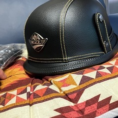 開封済み未使用美品ヘルメットセットの画像