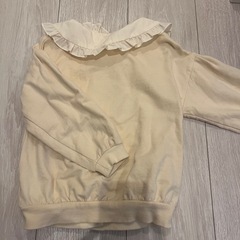 フリル付きクリーム色カーディガン 100サイズの画像
