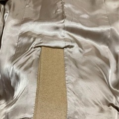 インタープラネットベージュ コートの画像