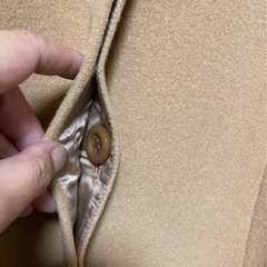 インタープラネットベージュ コートの画像