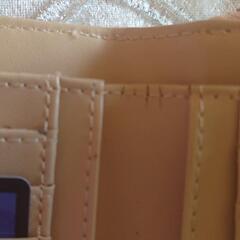 値下げしましたモアナの財布の画像