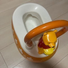 プーさんのおまるとミッキー補助便座の画像