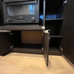 電子レンジが置ける収納棚です。の画像