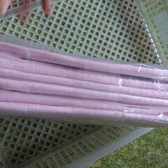ピンクのシーツの画像