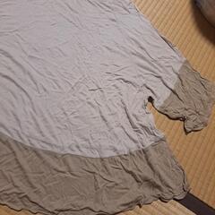 UNIQLOダブルスタンダードトップスの画像