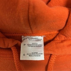 オレンジ フードパーカーSサイズ i am soccer 古着の画像