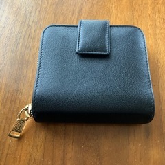イヴ・サンローラン 二つ折財布 黒 保証書ありの画像