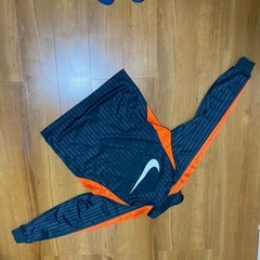 NIKE ストライプジャージ M ネイビー/オレンジの画像