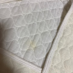 おくるみ　シミありの画像