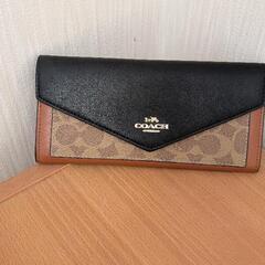 COACHのトートバックと長財布セットの画像
