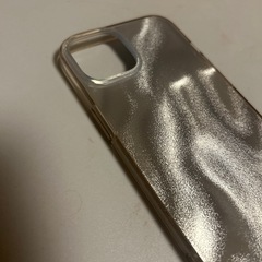 スマホケース スリーコインズ (iPhone14用です）の画像