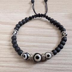 オニキス三眼天珠マクラメブレスの画像