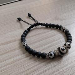 オニキス三眼天珠マクラメブレスの画像