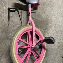 ピンクの一輪車の画像