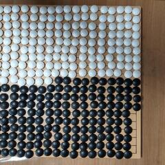 碁盤と碁石のセットの画像