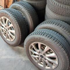 🆕2022年製BRIDGESTONE195/65R15スタッドレスタイヤVRX2&アルミホイール４本セット🆕の画像